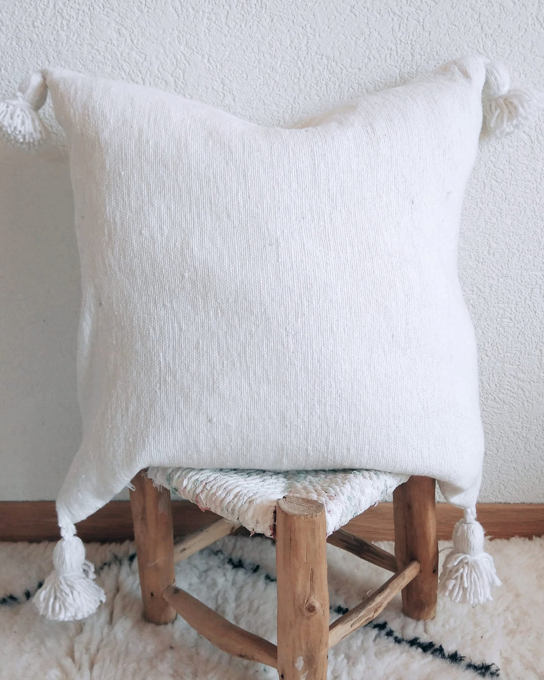 pompom cushion white